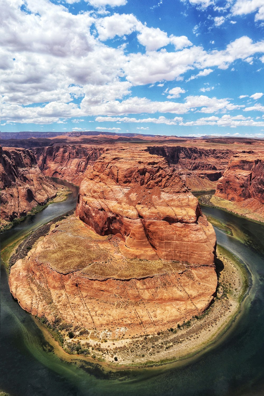 brown rock formation under blue sky during daytime