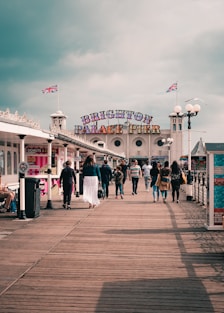 people walking on wooden dock during daytime