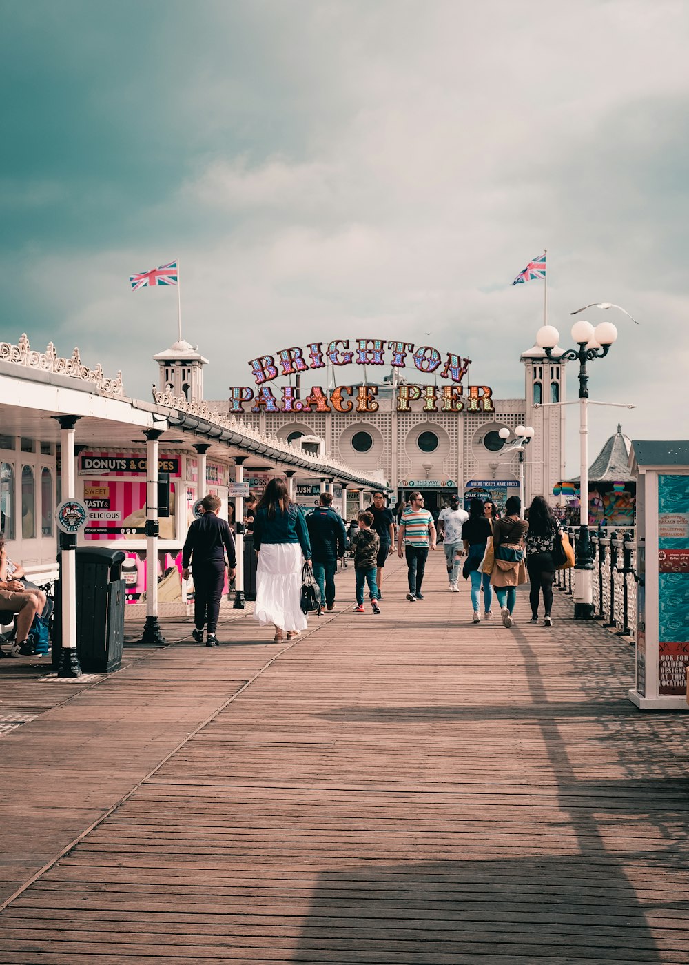 people walking on wooden dock during daytime