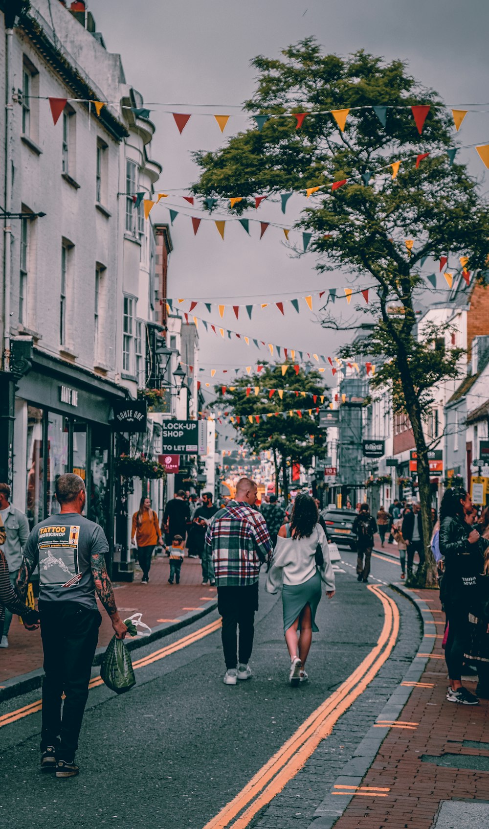 people walking on pedestrian lane during daytime