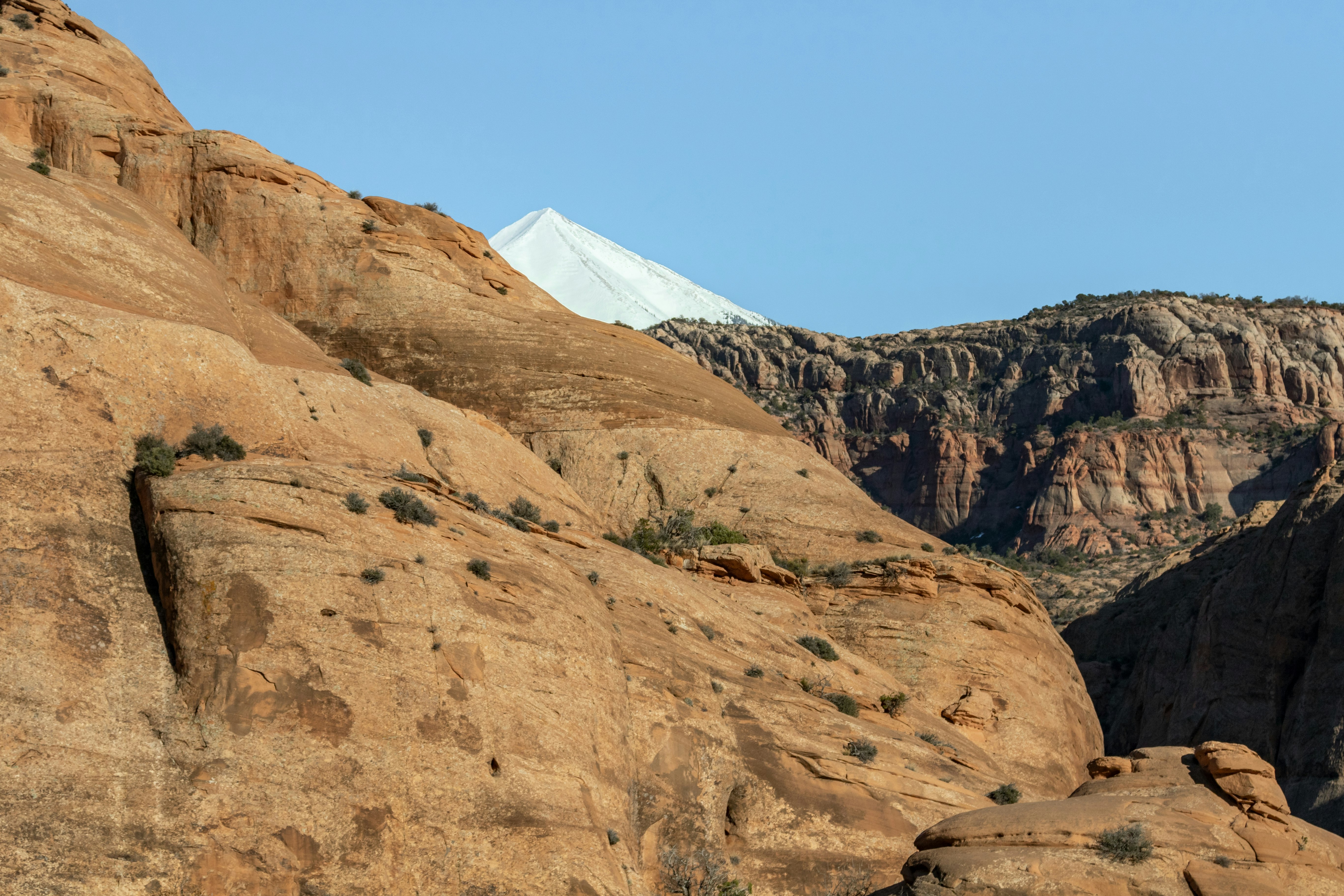 brown rocky mountain under blue sky during daytime