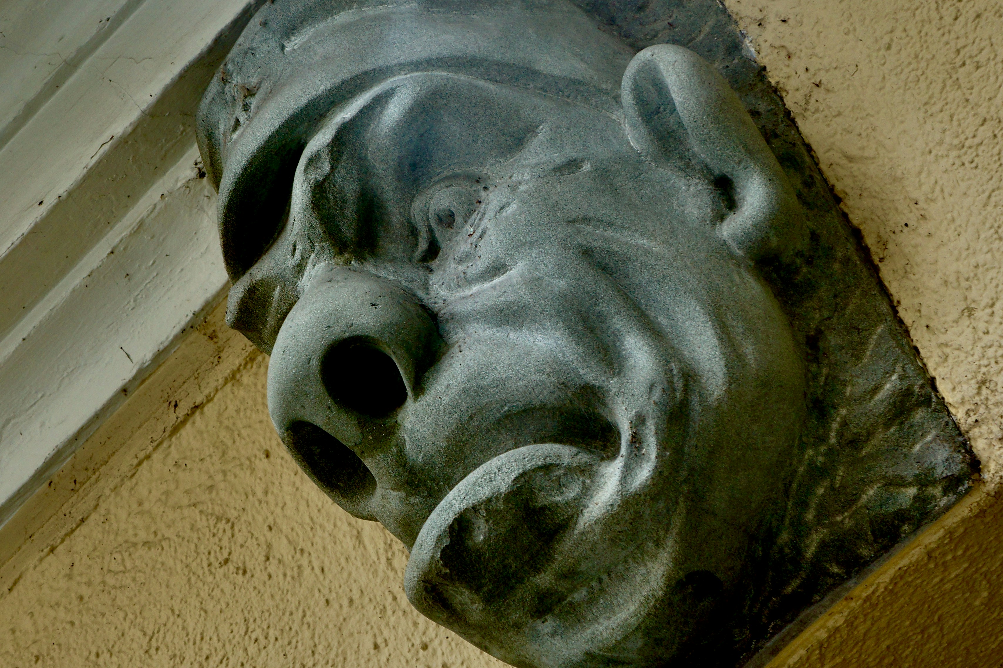grey concrete human face bust