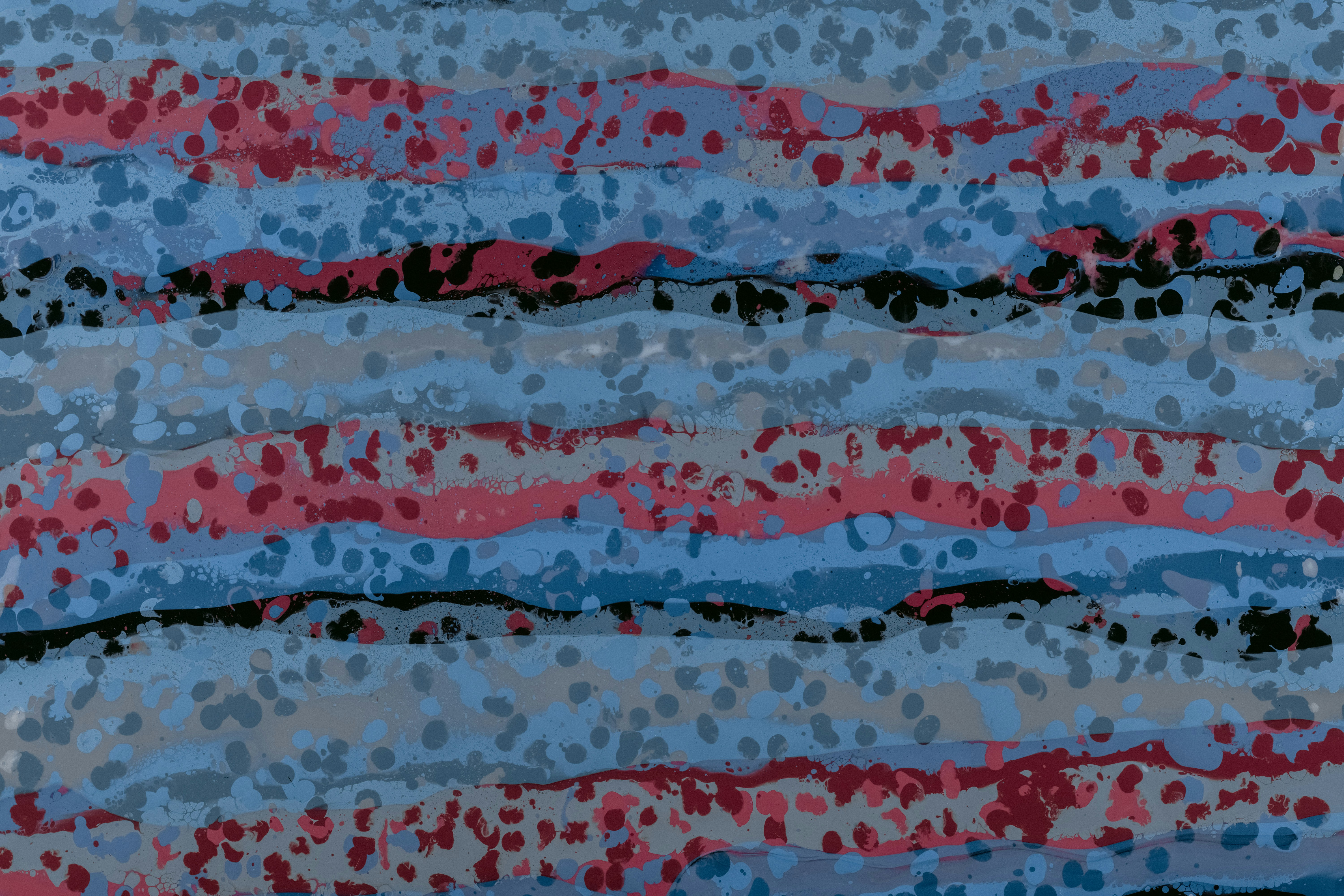 white red and black textile