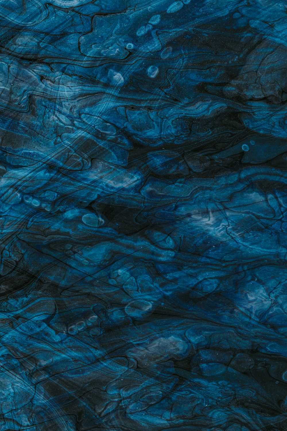 blue and black abstract painting
