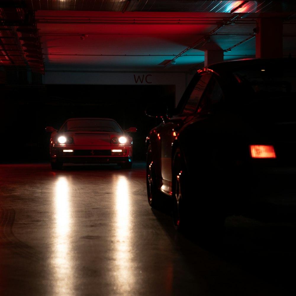 cars parked in parking lot during night time