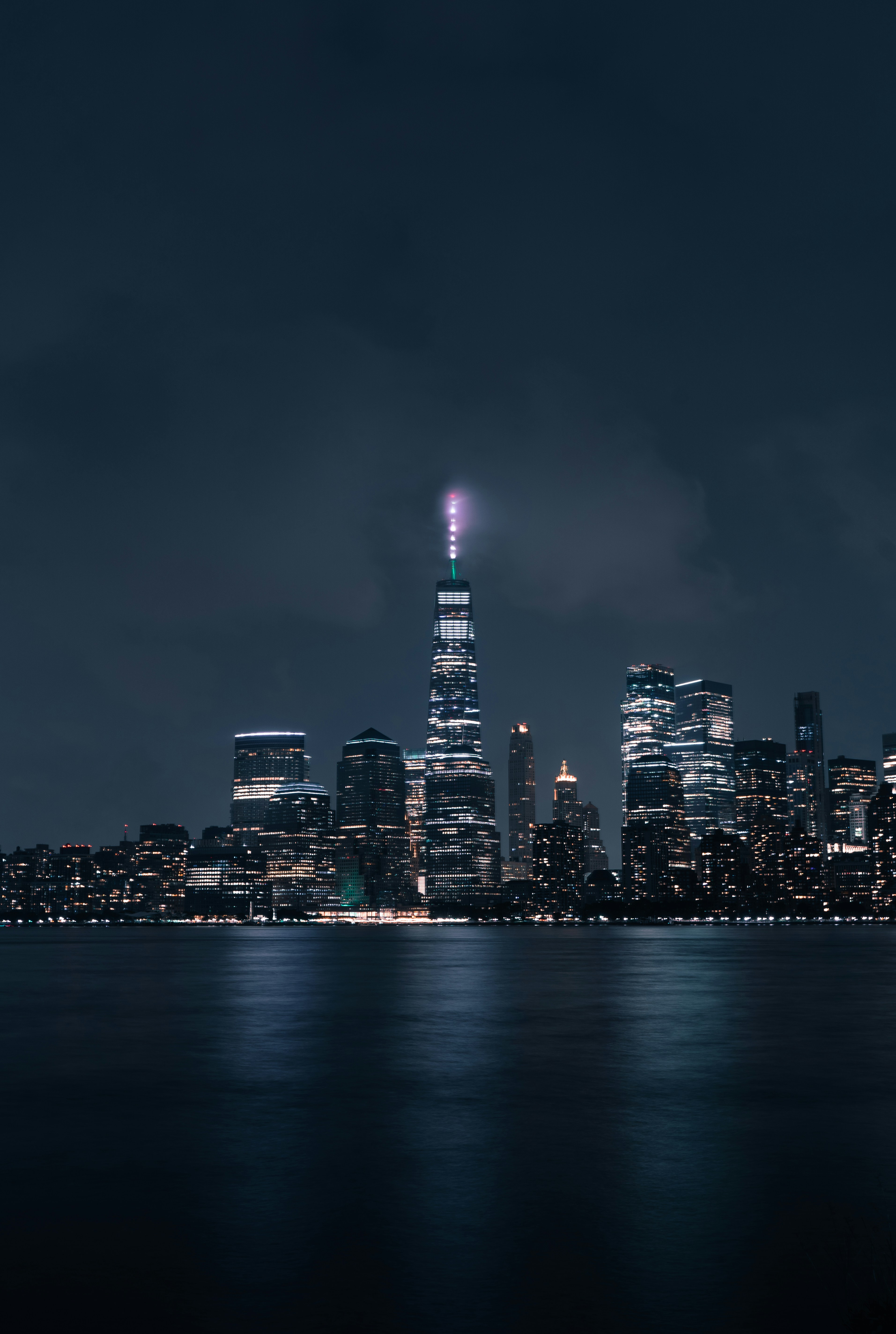 city skyline during night time