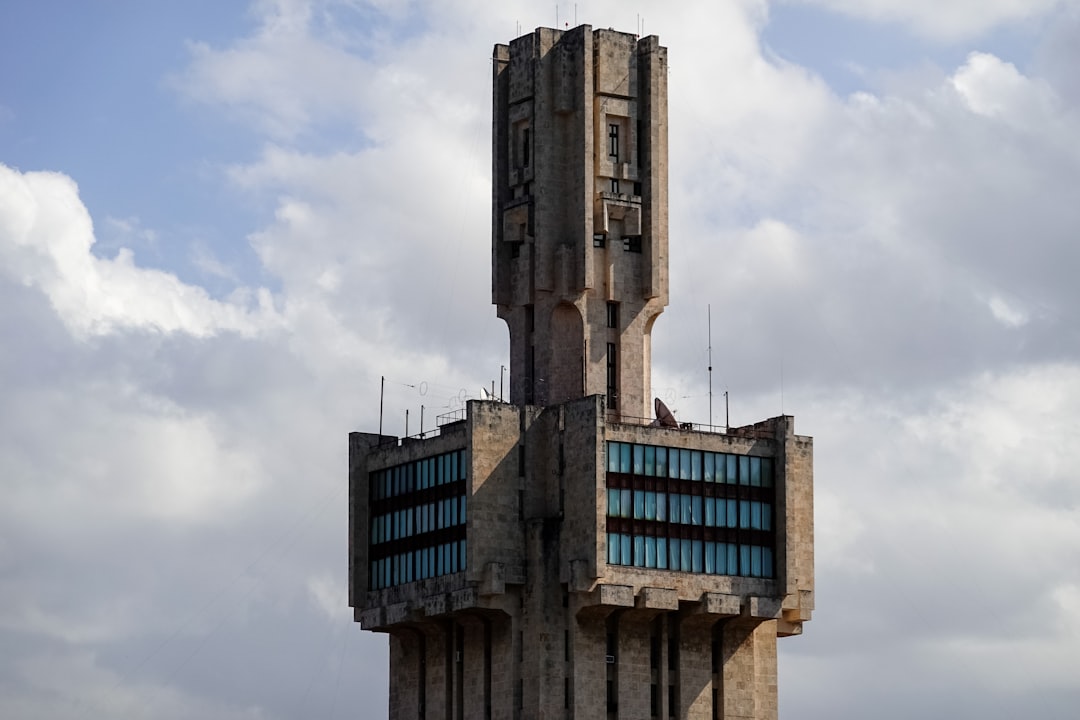 gray concrete building under blue sky during daytime