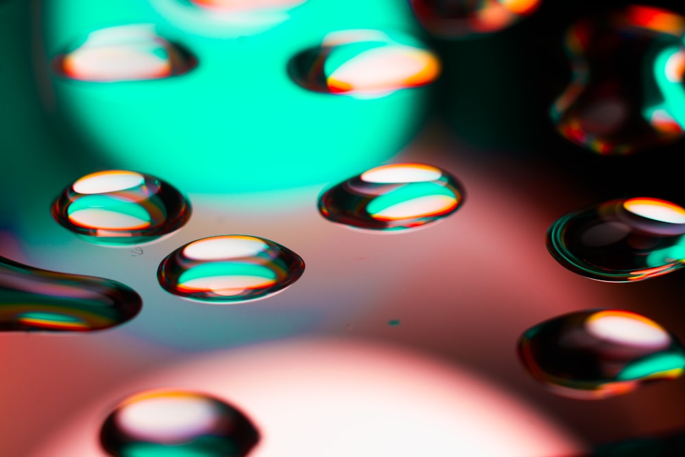 blue green and orange water droplets