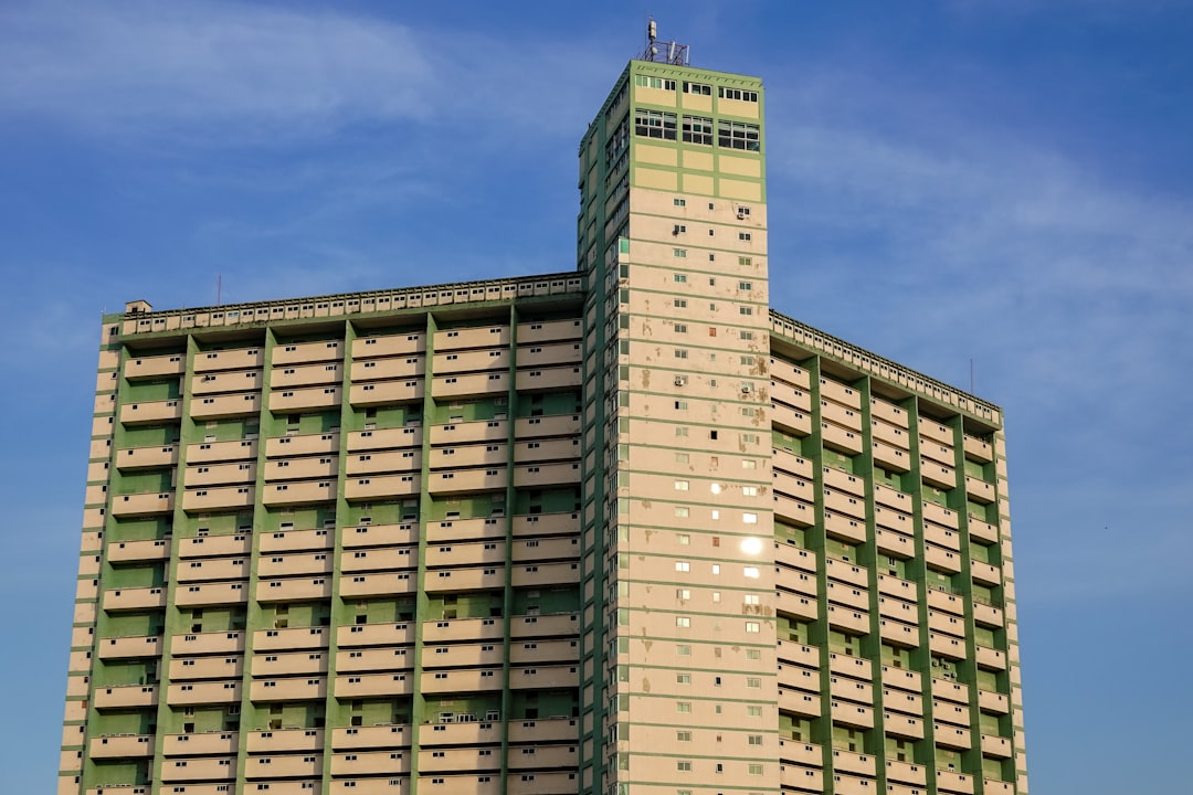 brown concrete building under blue sky during daytime