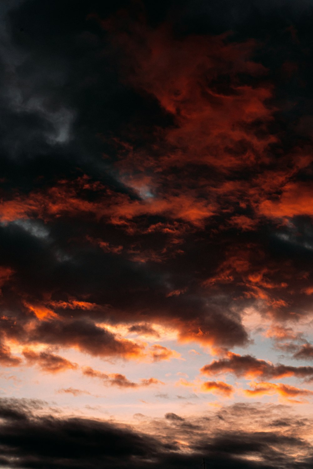 black clouds and blue sky