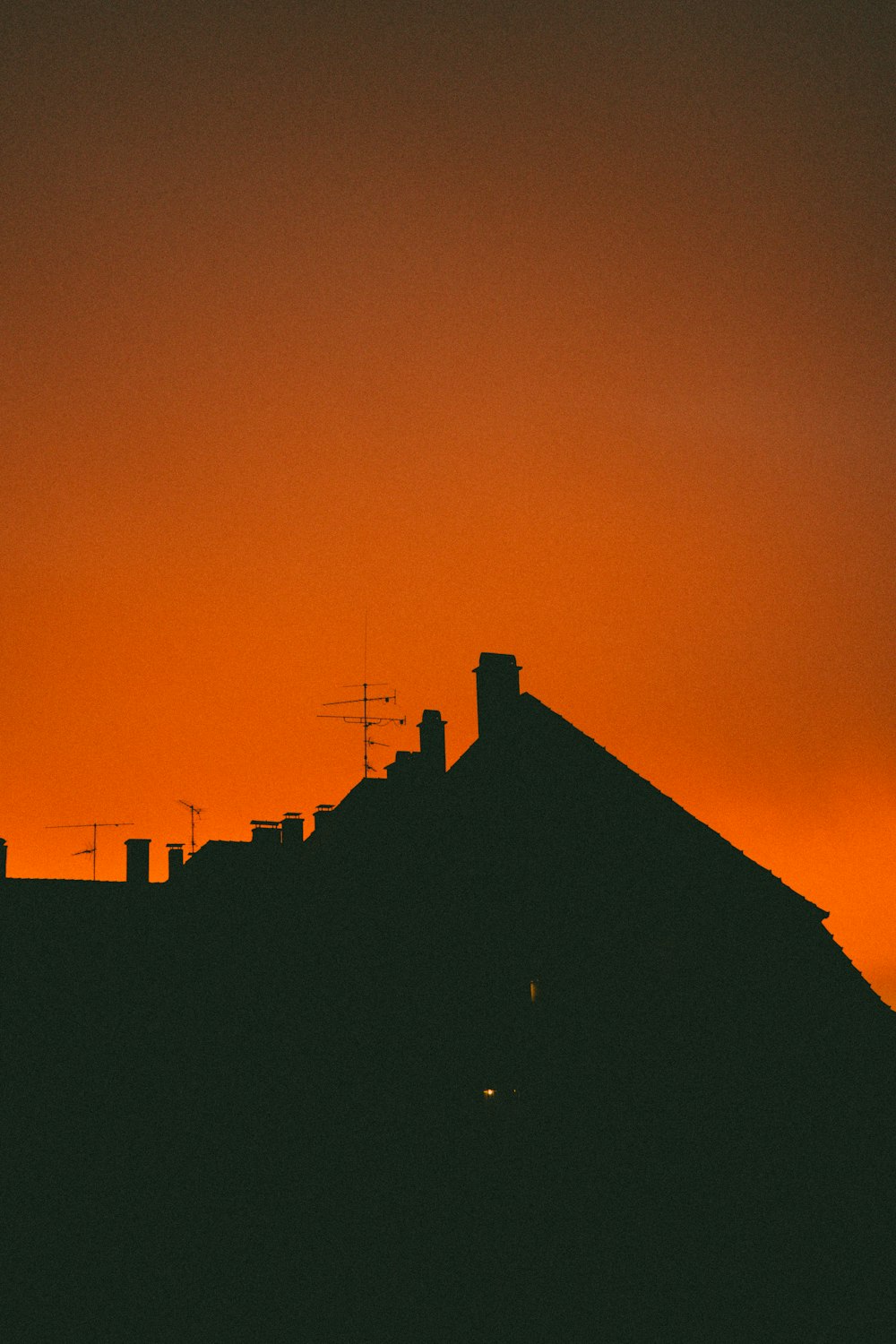 silhouette of building during sunset
