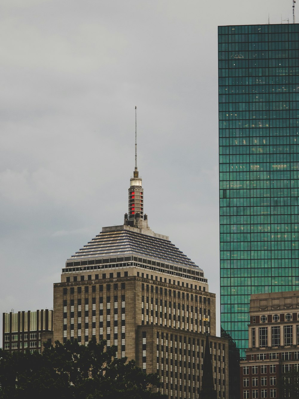 brown concrete building under white clouds during daytime