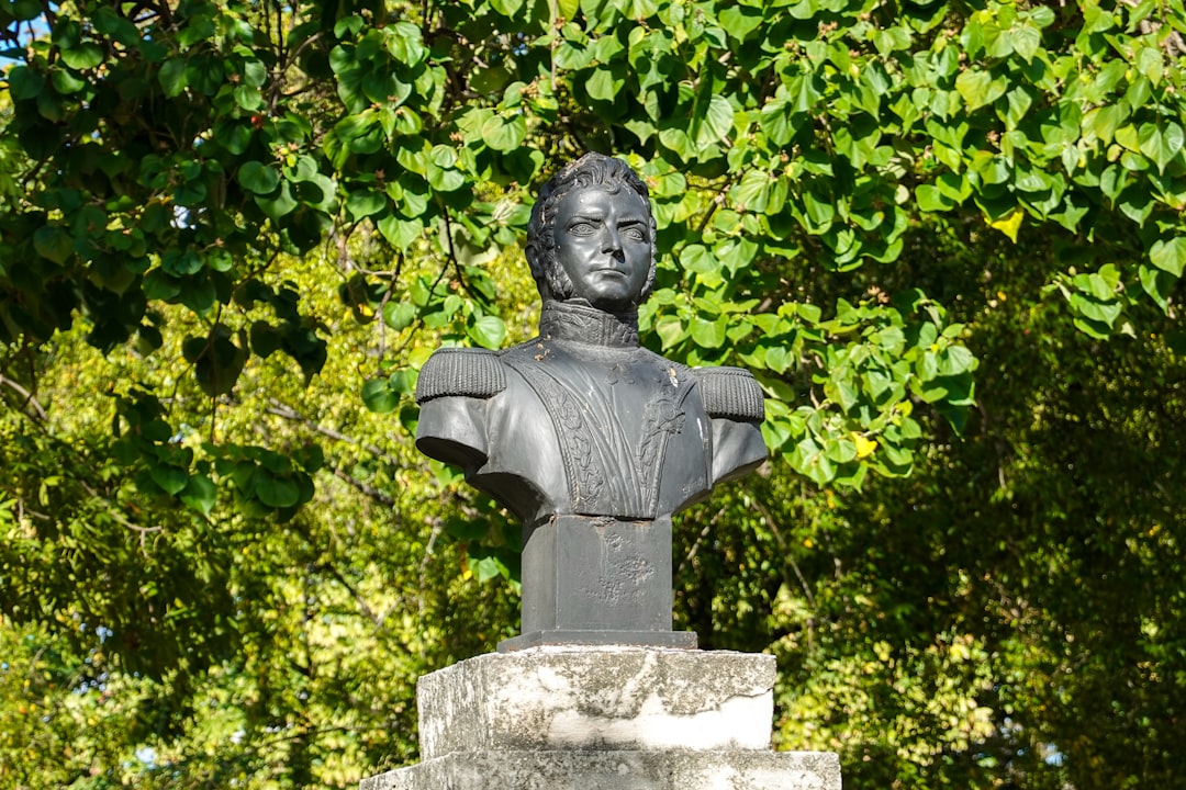 gray concrete statue of a man