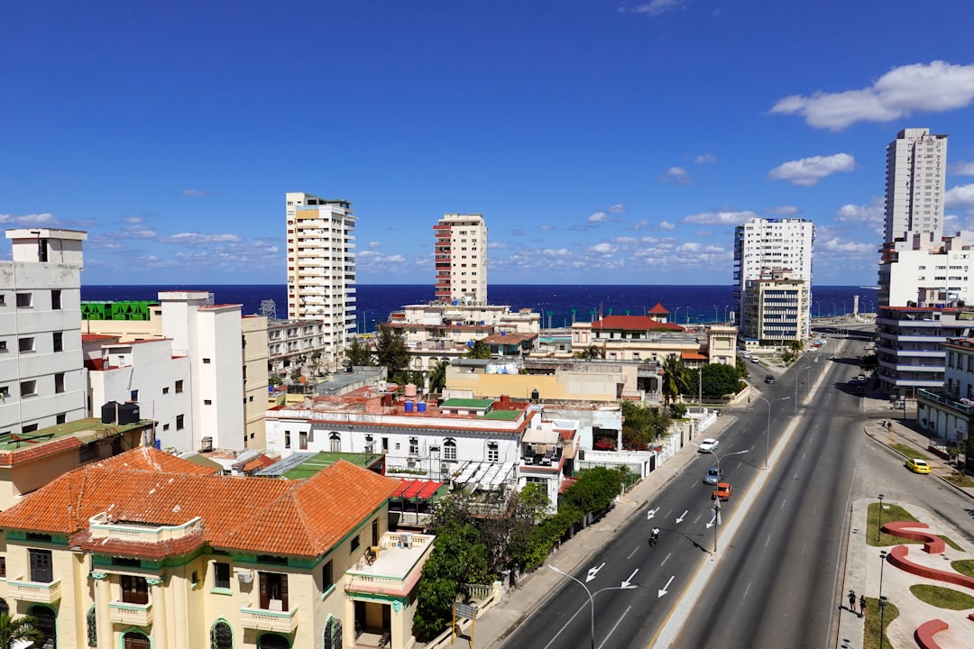 white and brown concrete buildings under blue sky during daytime