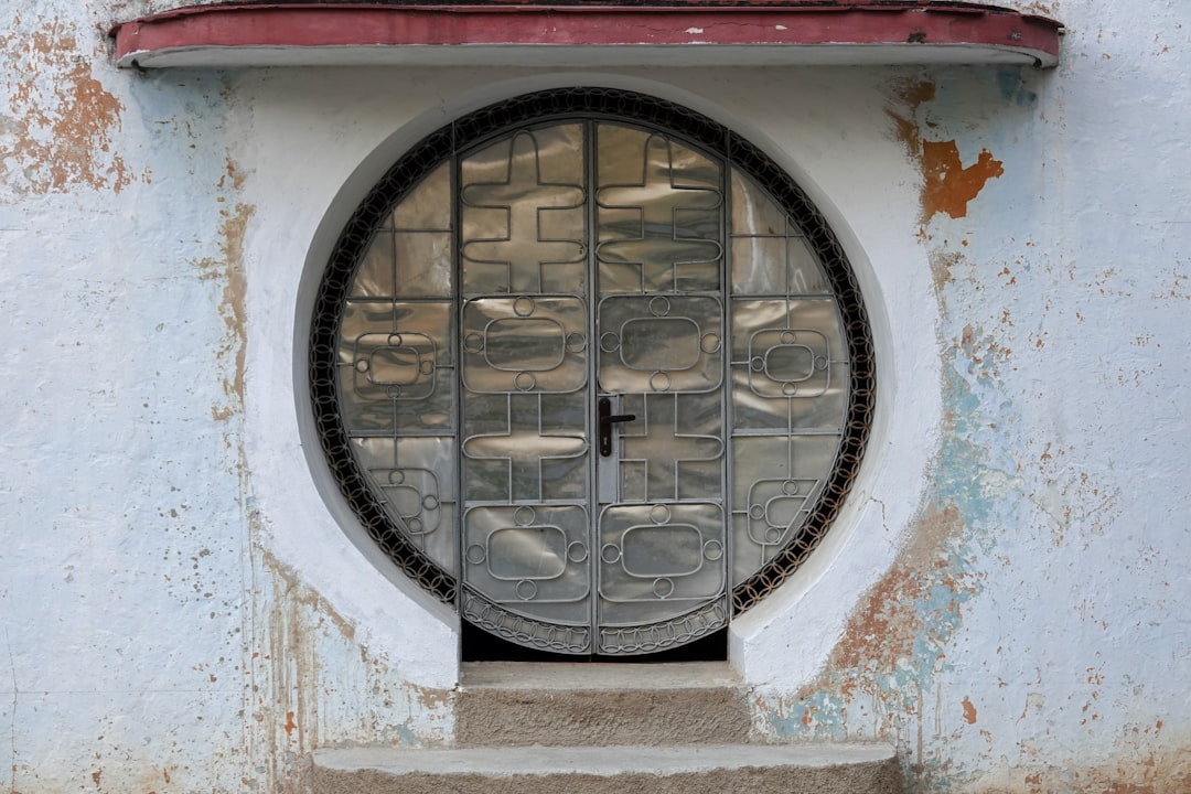 black metal framed glass window