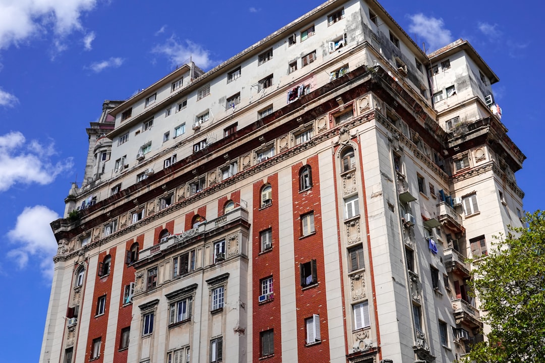 brown concrete building under blue sky during daytime