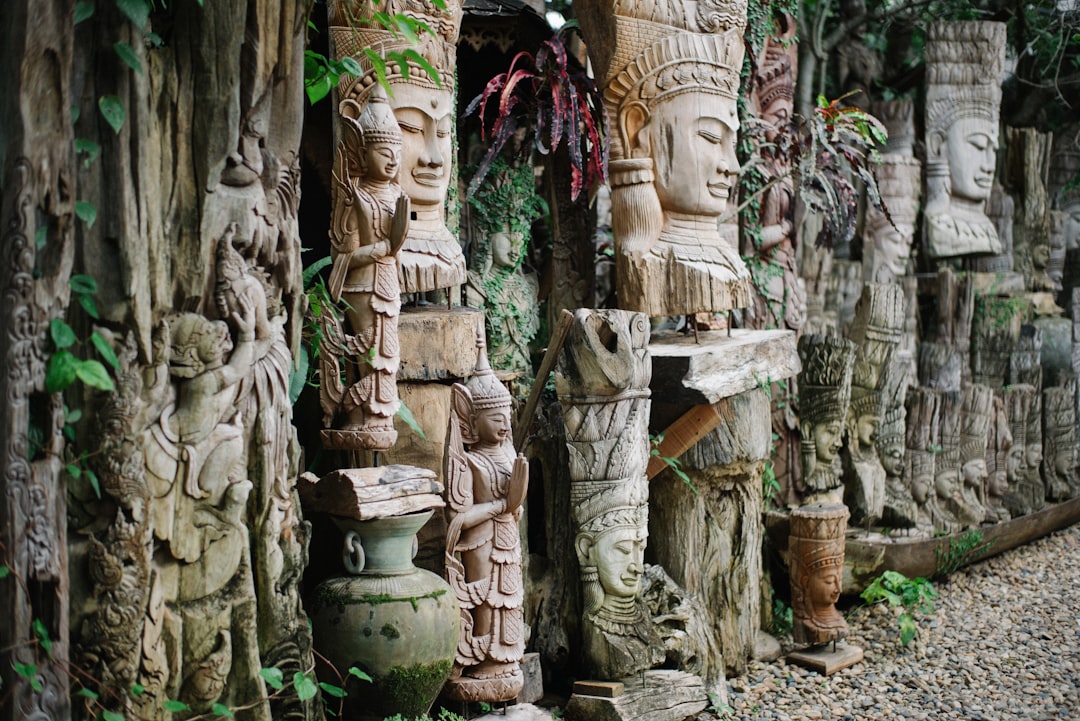 brown wooden statue of man