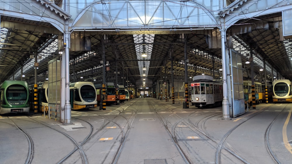 white and yellow train on train station