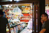 A cozy corner with shelves filled with collectibles and fan-made crafts.