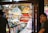 A satisfied customer browsing through collectibles in a vibrant store.