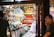 A satisfied customer browsing through collectibles in a vibrant store.