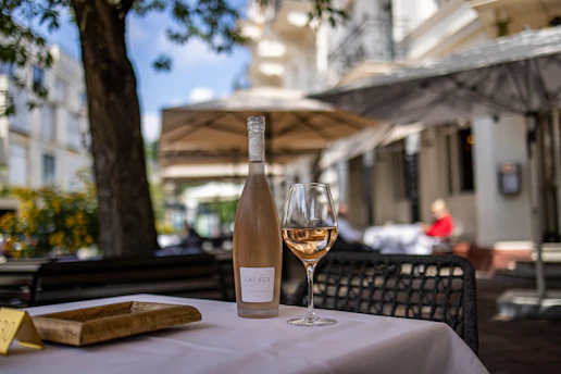 clear wine glass on white table