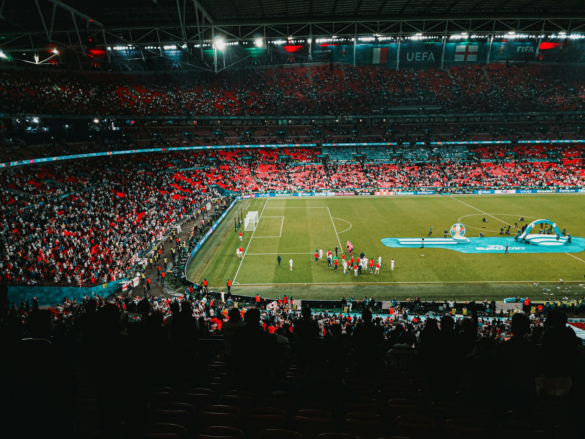 people watching football game on stadium