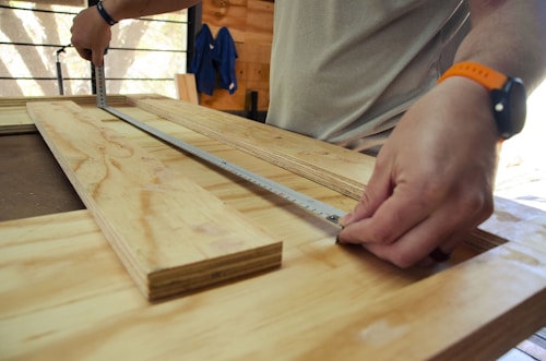 Hand carving a wooden spoon with a hook knife
