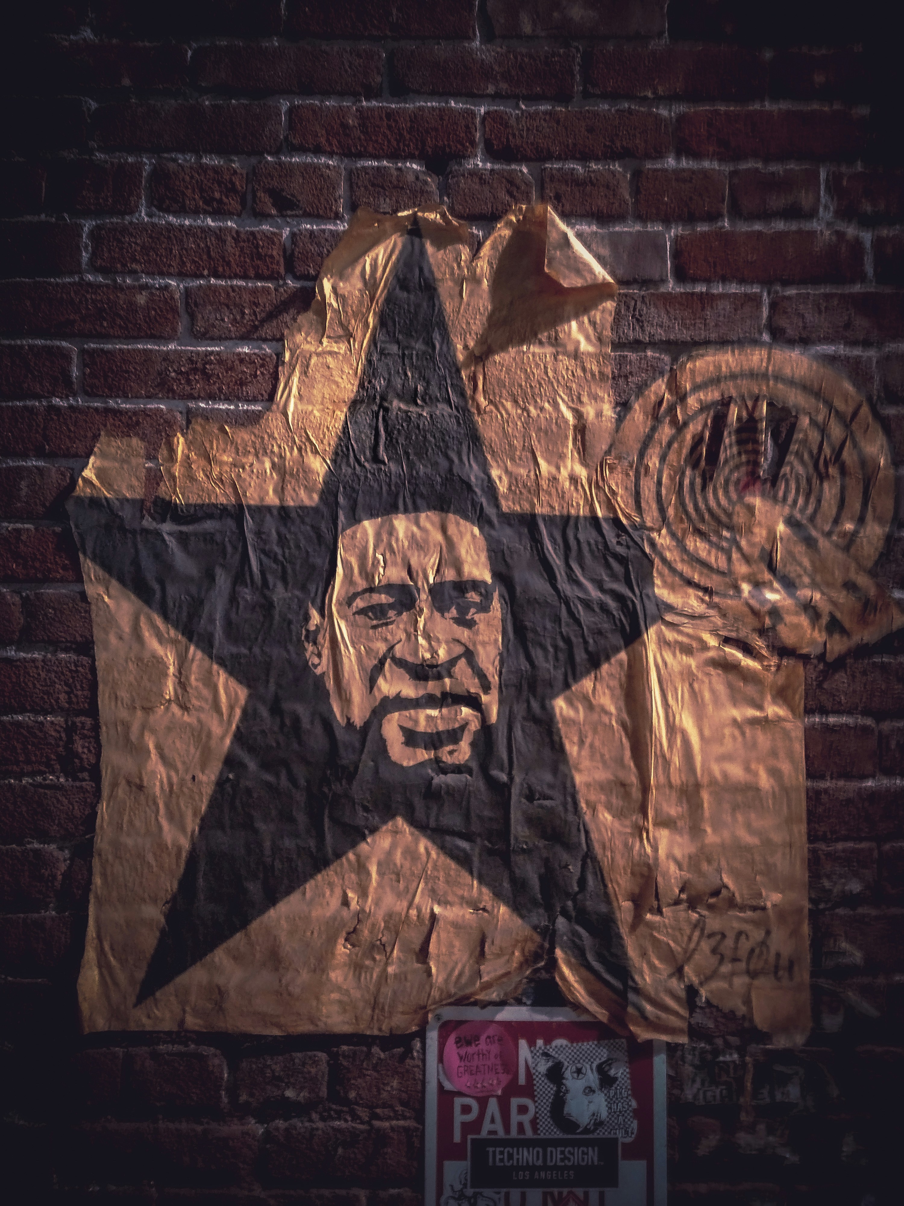 brown and black wooden carved wall decor