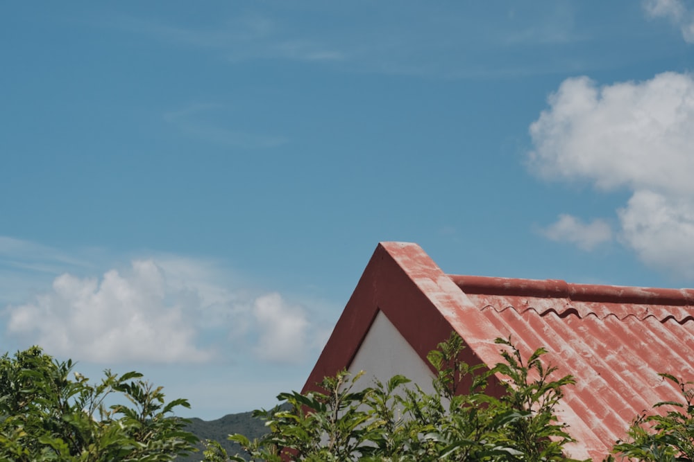 red roof under blue sky during daytime