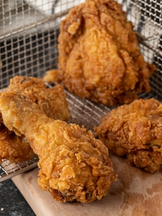 fried chicken on black metal frame