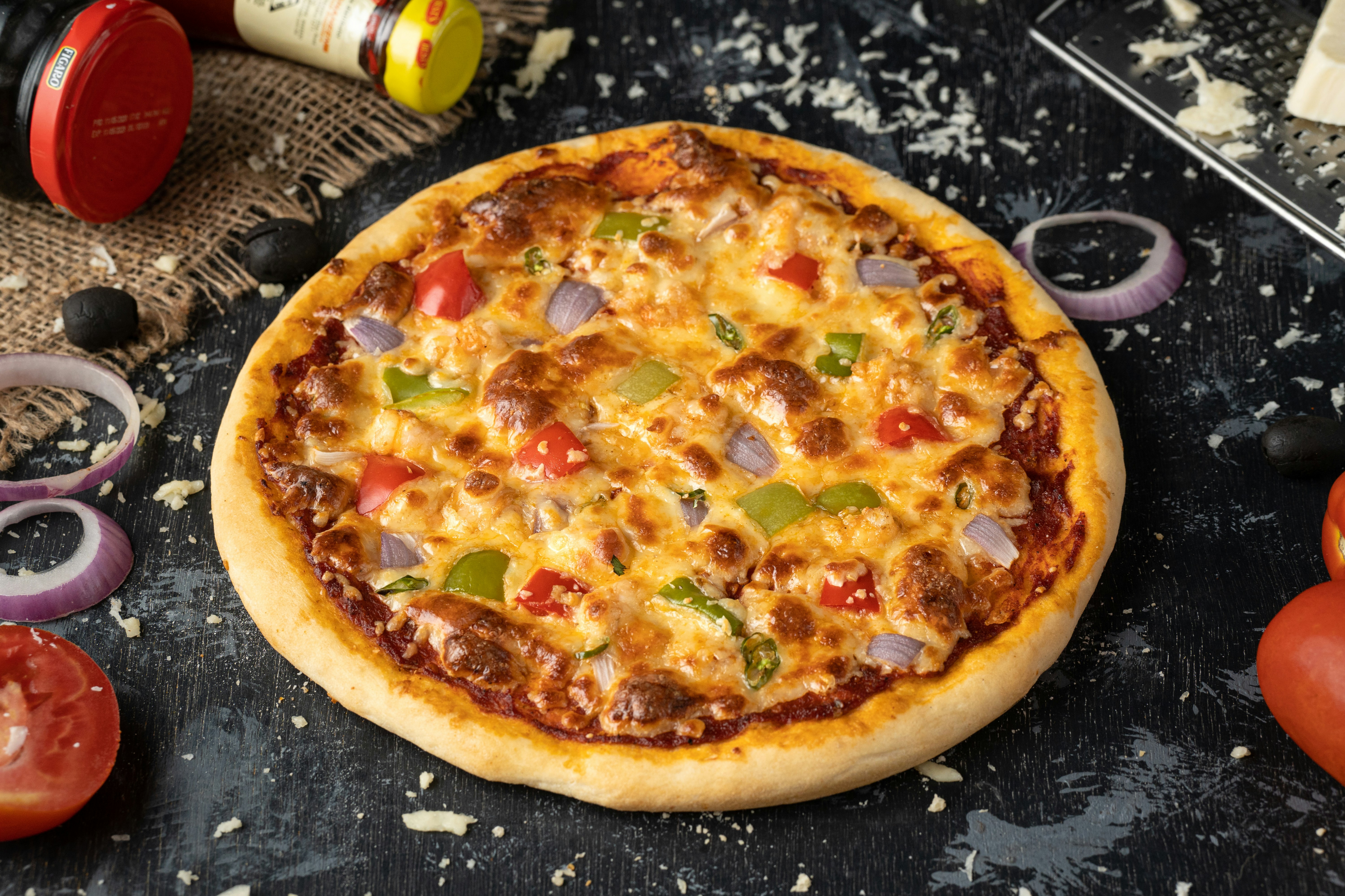 pizza on black and white ceramic plate