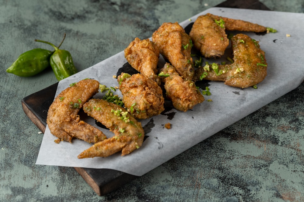 fried chicken on gray rectangular tray