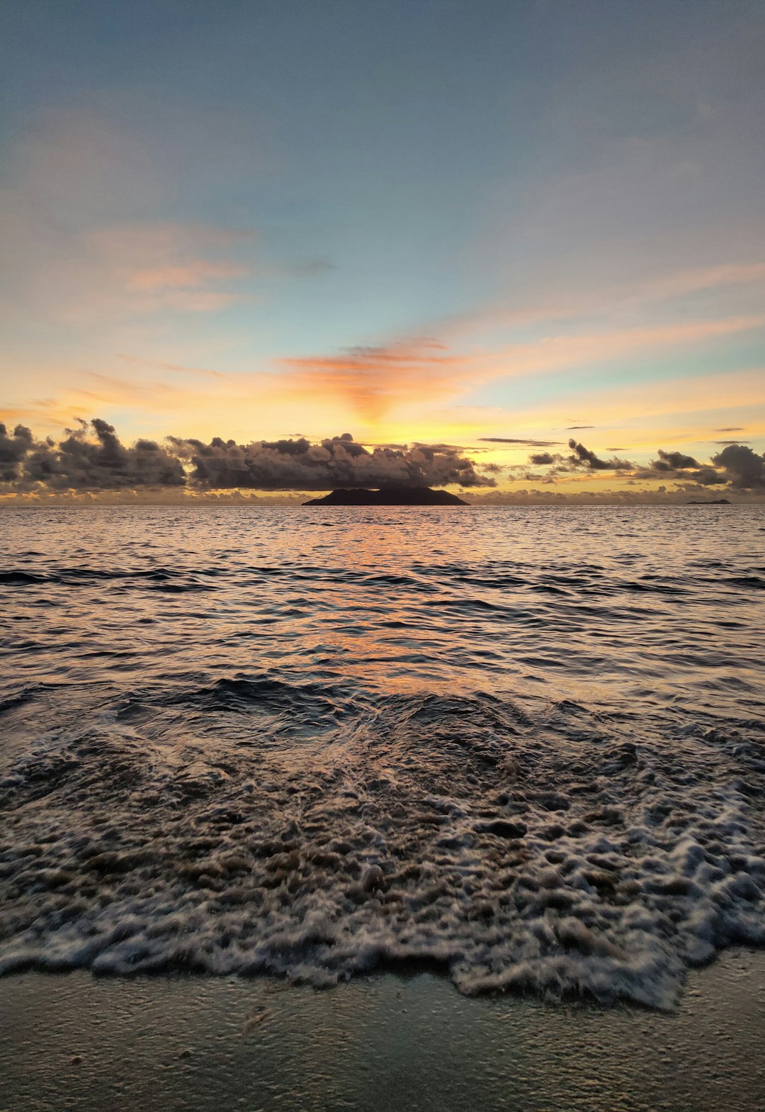 body of water during sunset