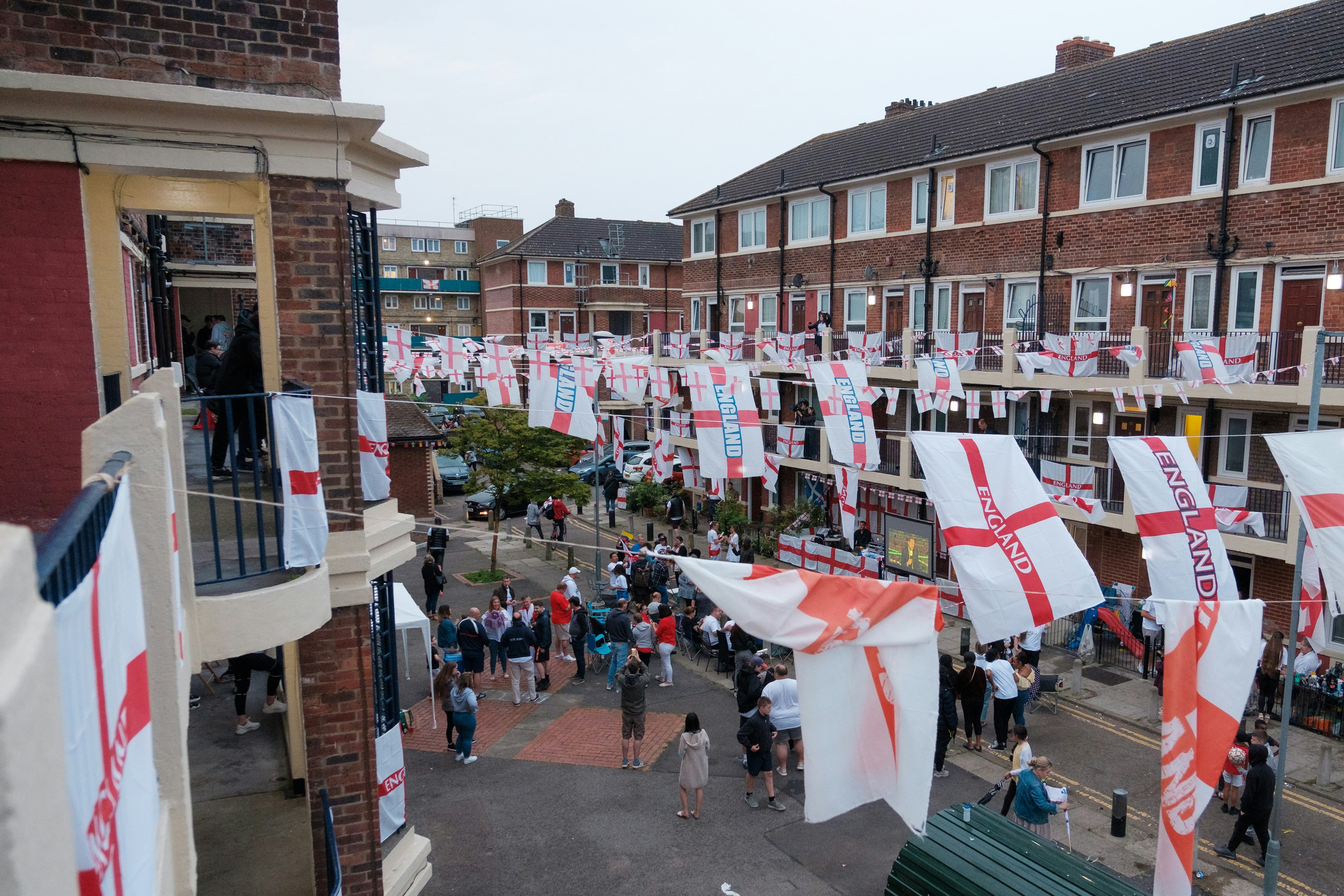 A Community Estate Watching the Euro 2020 Finals Match on the street