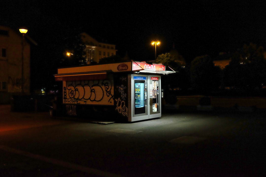 white and brown store during night time