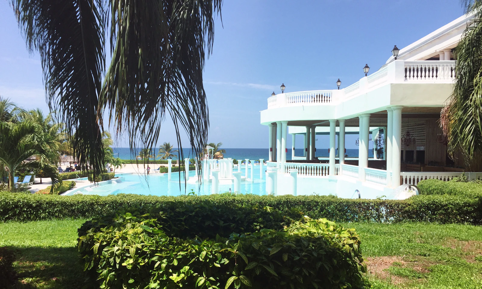 A hotel pool at the edge of the Caribbean, which is what most visitors to Montego Bay actually see
