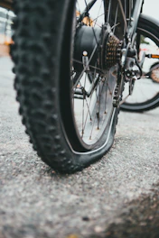 black bicycle wheel with tire