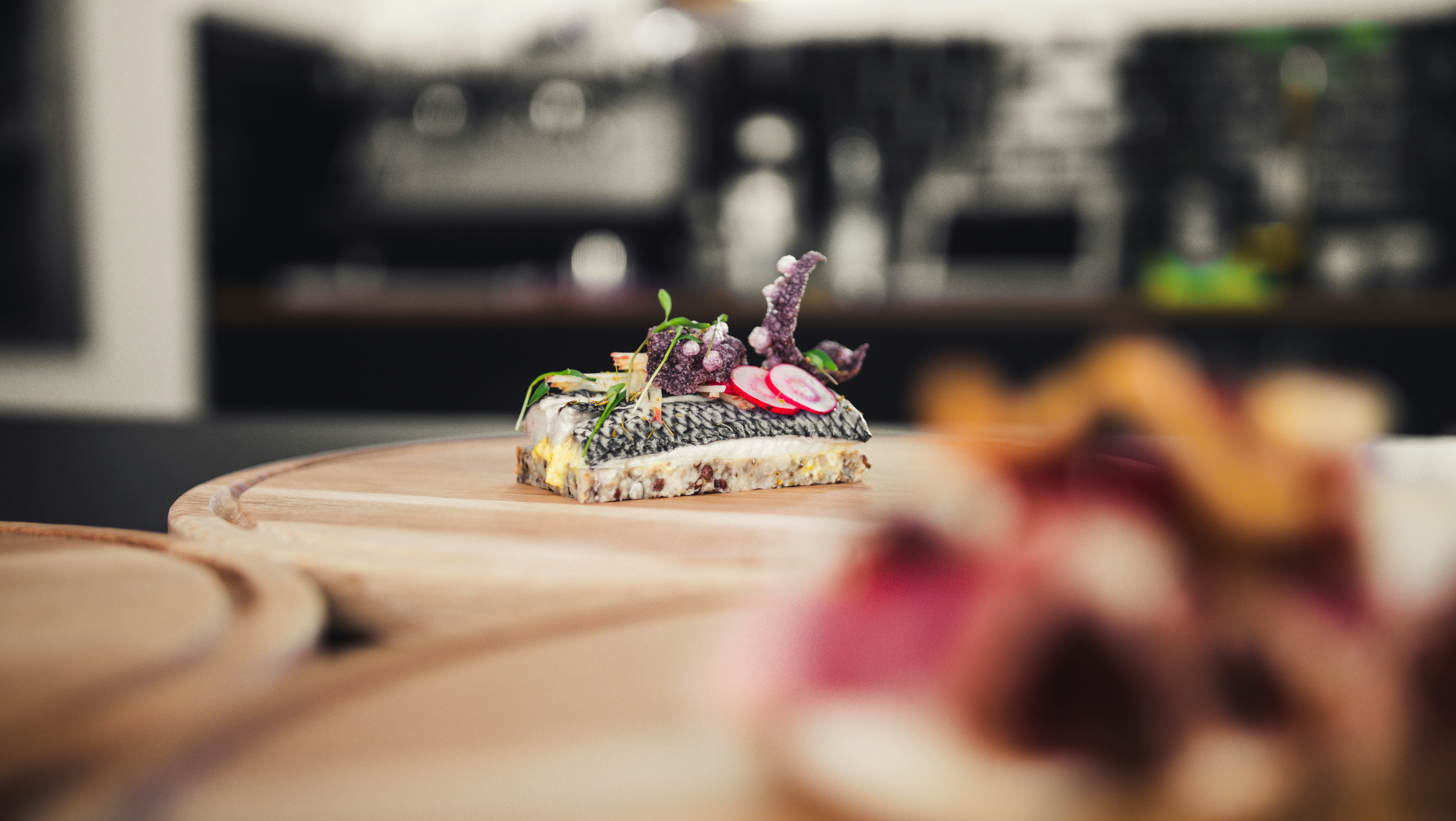 white and brown cake on brown wooden table