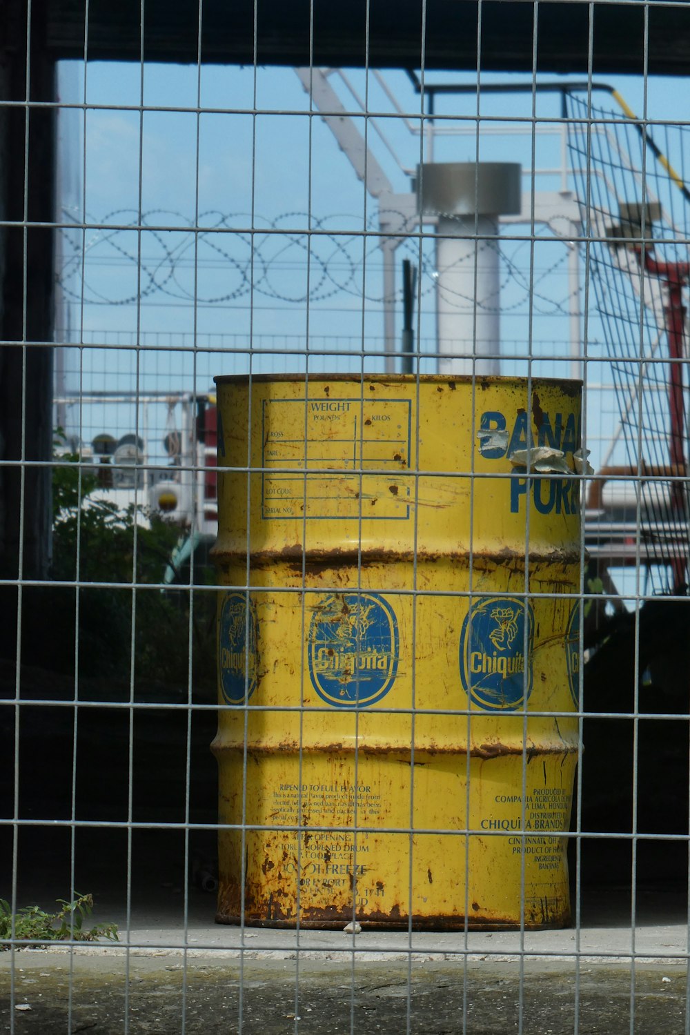 yellow and blue trash bin