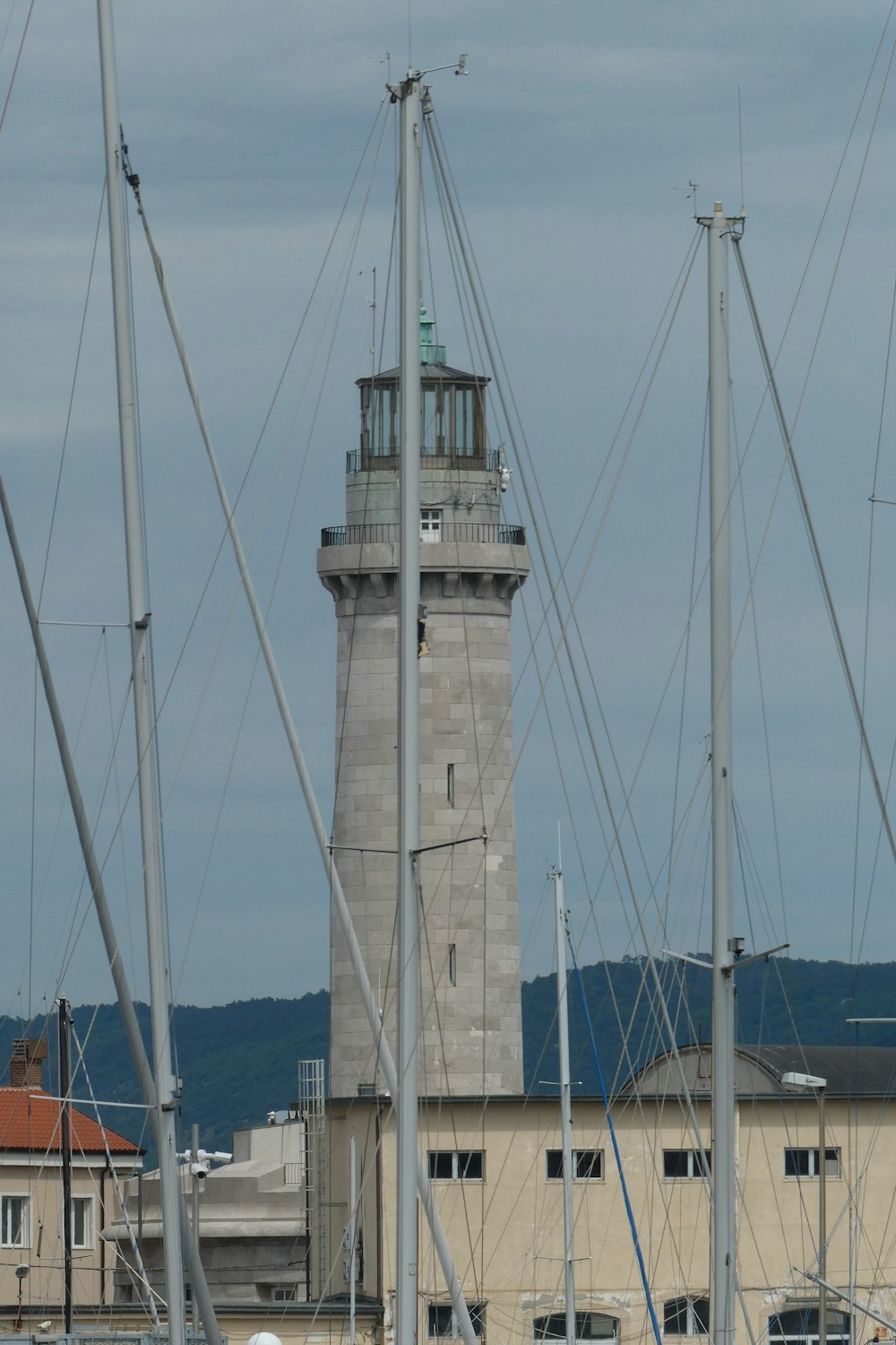 brown and white concrete lighthouse during daytime