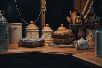 brown and white ceramic container on brown wooden table