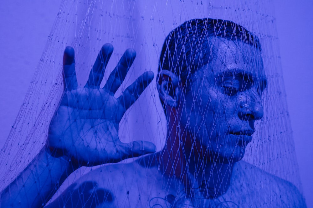 man in water with water droplets