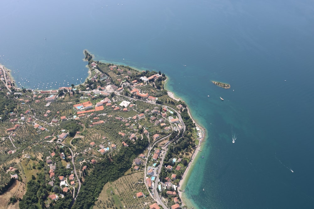 aerial view of city near body of water during daytime