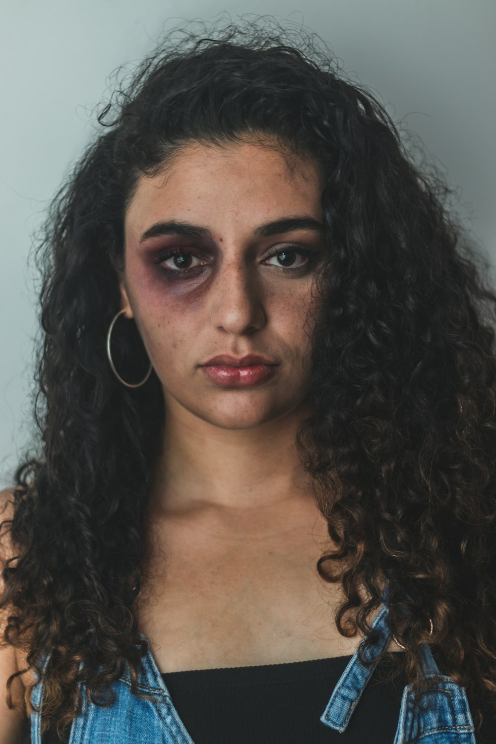 woman in silver hoop earrings