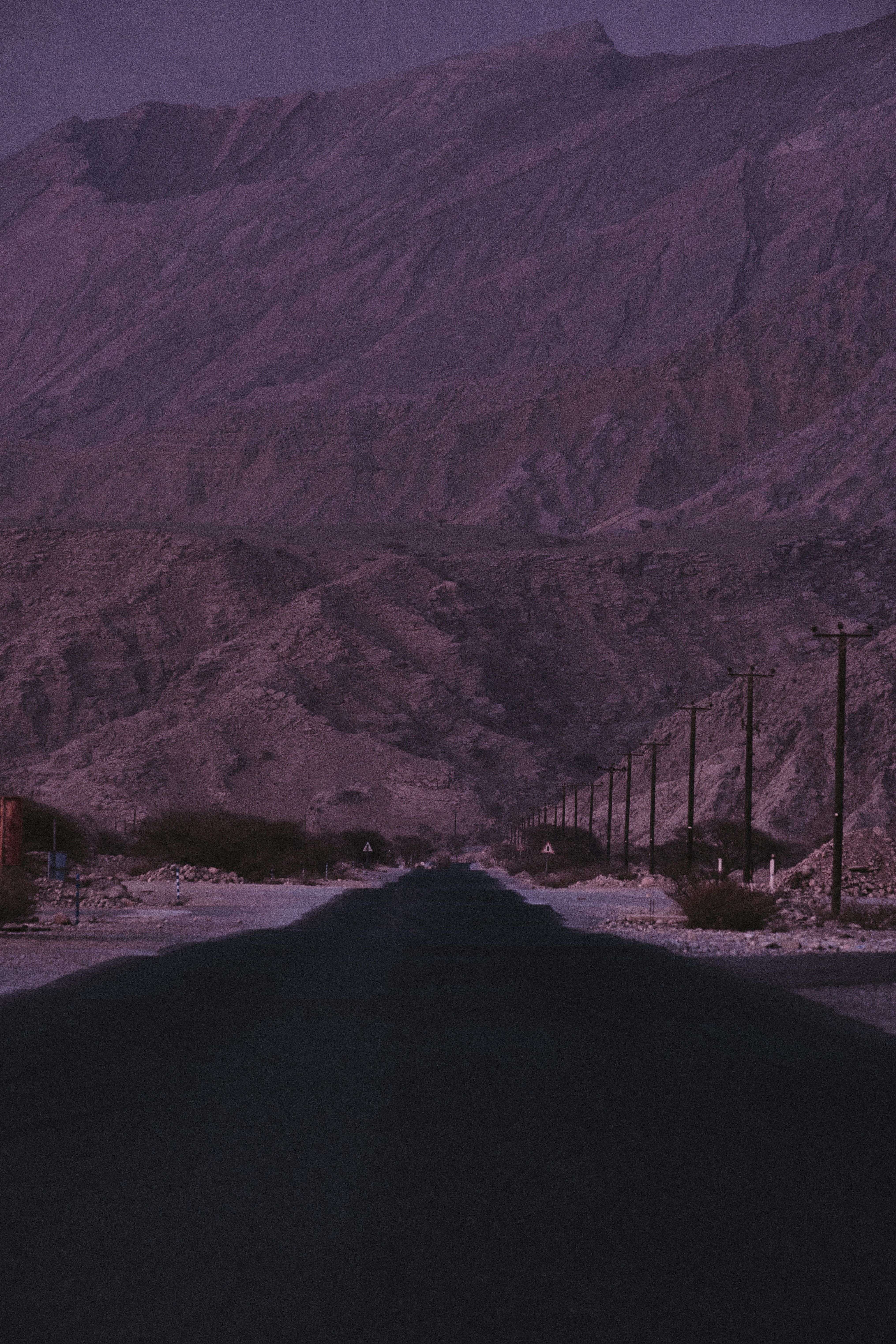 brown mountain under gray sky during daytime