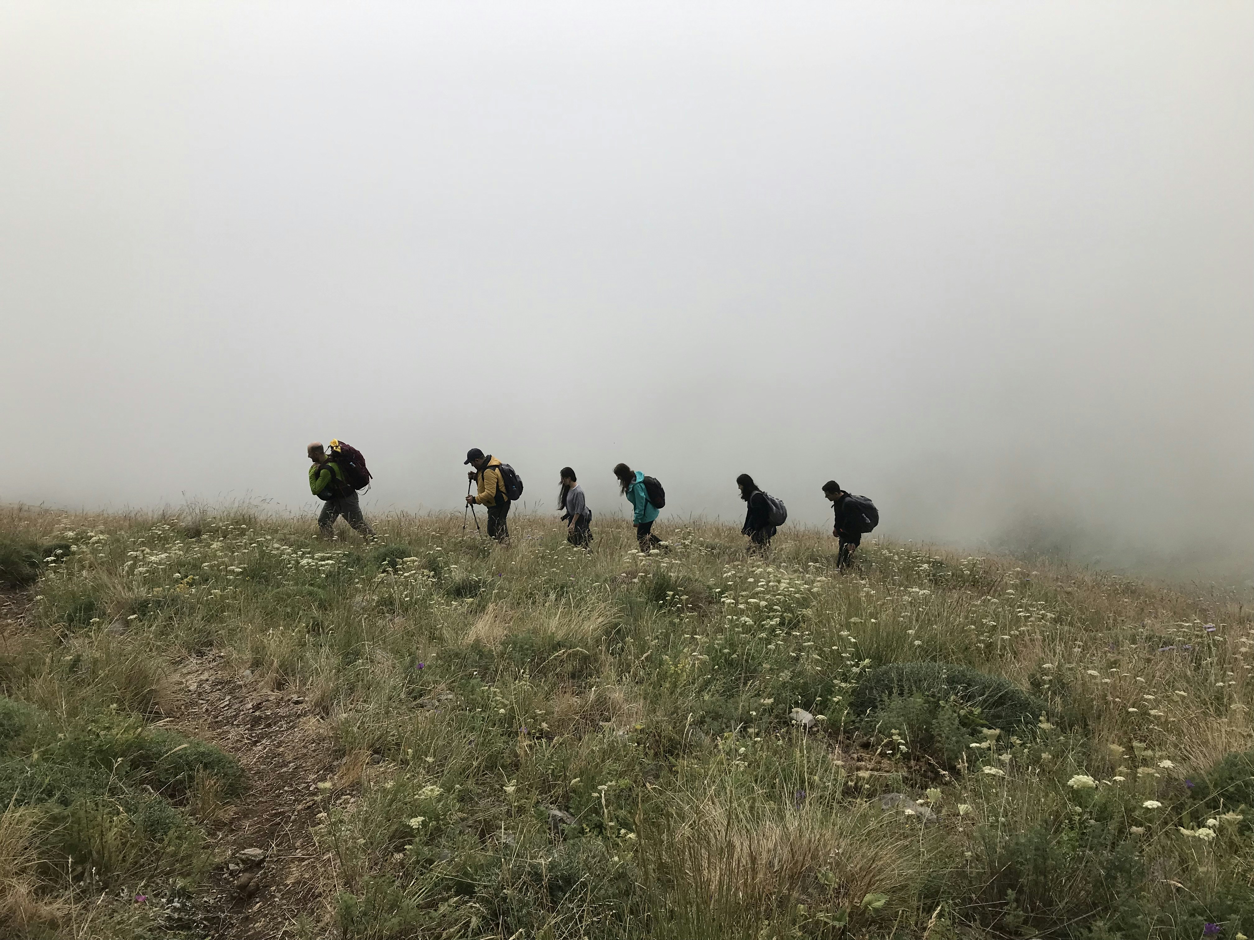 Diverse plus-size travelers hiking together in Armenia