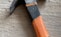 black and orange handle black handle