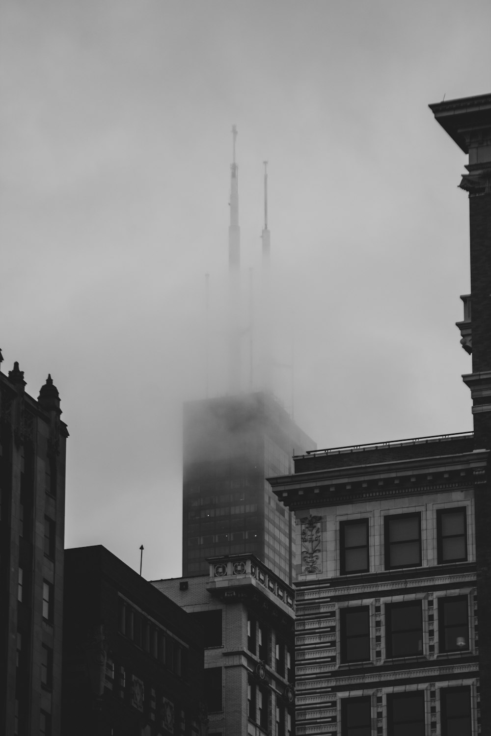 grayscale photo of high rise building