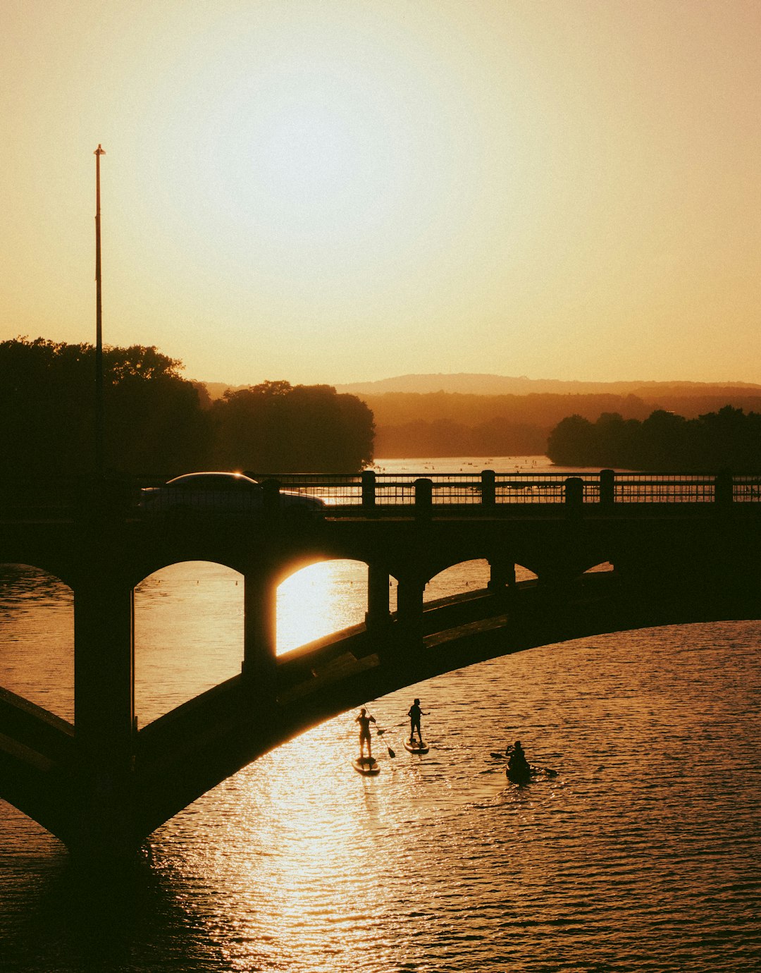 silhouette of bridge during sunset